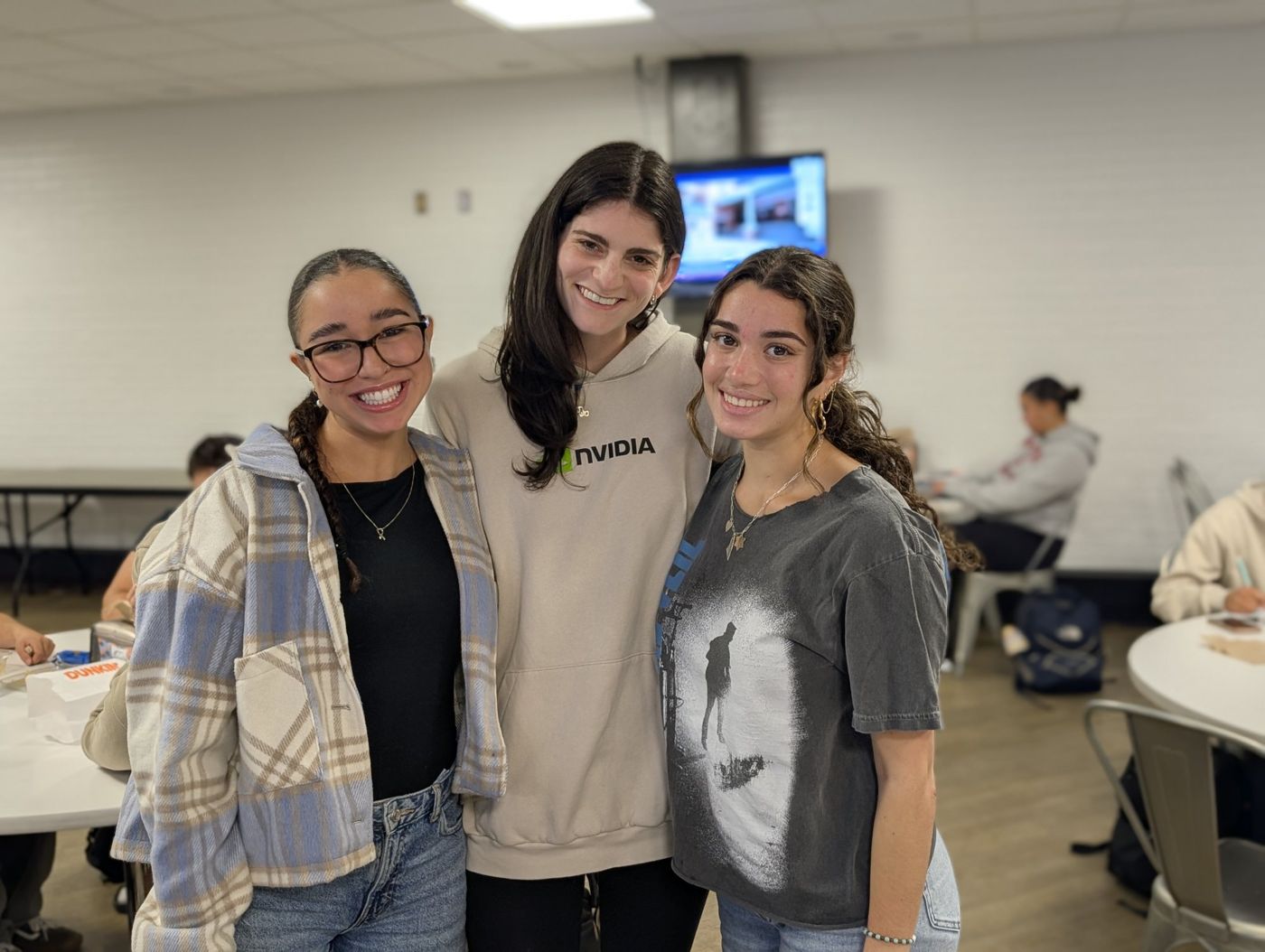 Students smiling together at Food for the Soul
